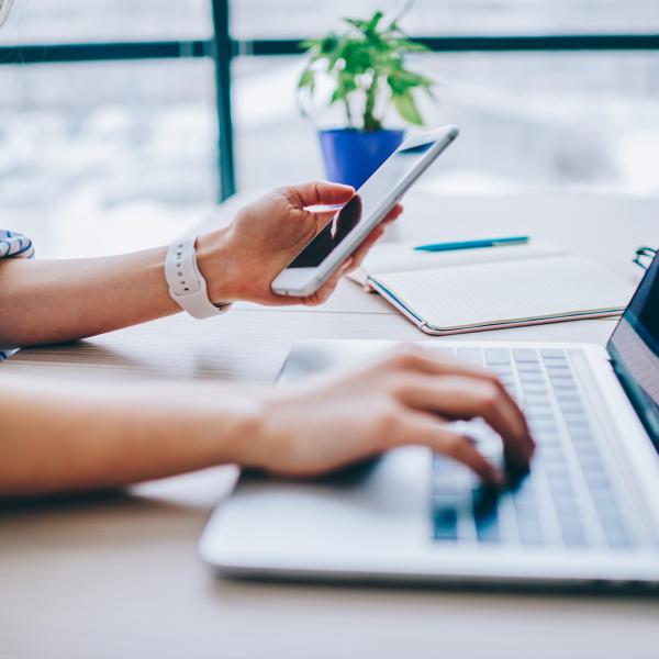 person typing on a computer